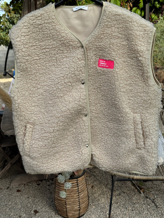 Gilet sans manches en moumoute