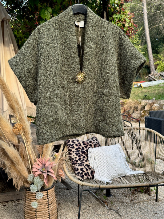 Gilet manches courte / broche soleil